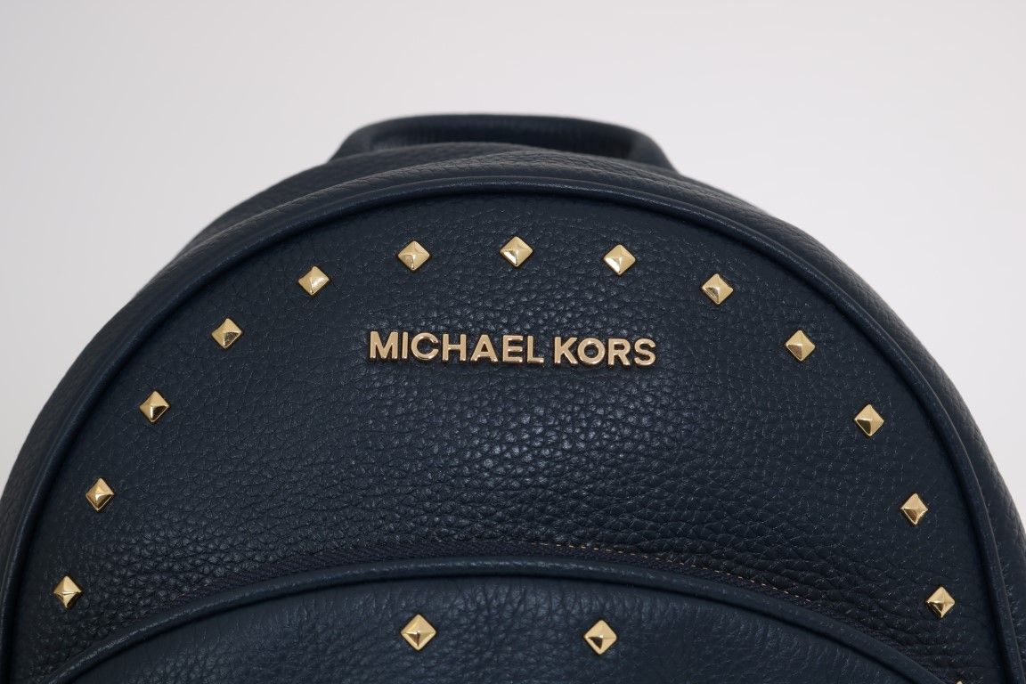 Michael Kors tummansininen nahkainen reppu